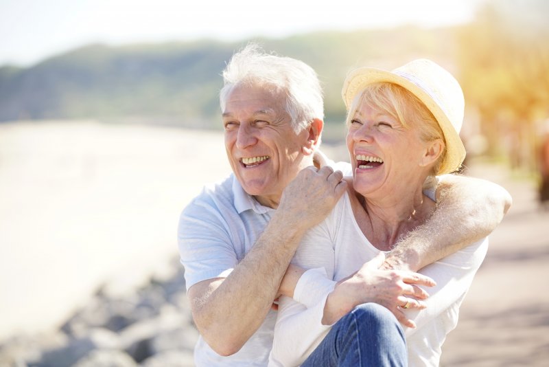 older couple with dental implants 